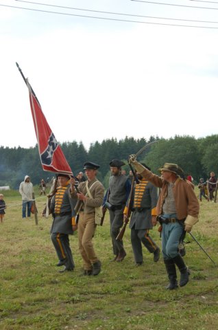 confederatesoldierswithflag.jpg