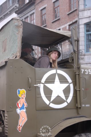 usfemalesoldierintruckwithmarkings.jpg