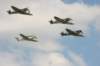 threespitfiresandoneme109duxford_small.jpg