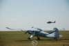 civilianaircraftwithmodernmilitaryhelicopter_small.jpg